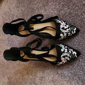 Embroidered black tie heels